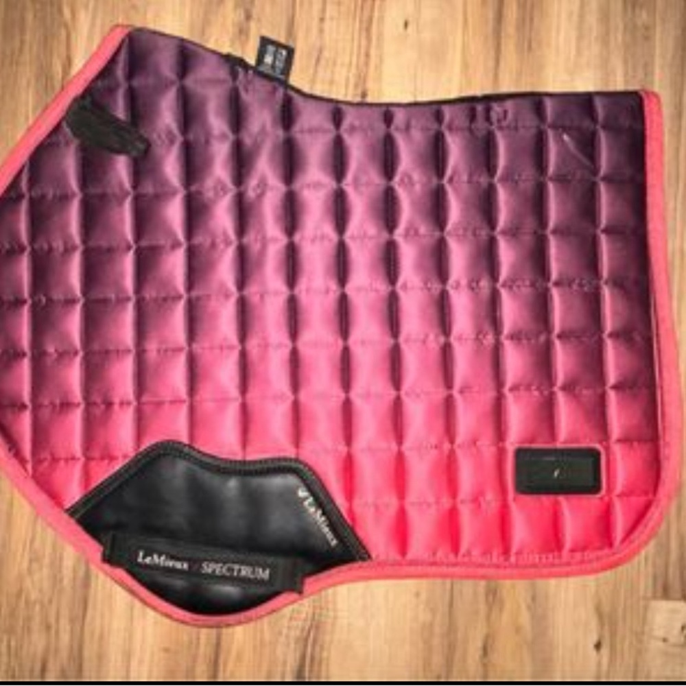 Papaya spectrum Lemieux saddle pad.